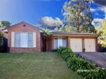 SPACIOUS SINGLE-LEVEL FAMILY HOME IN QUIET CUL-DE-SAC LOCATION