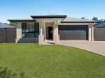 SPACIOUS FAMILY HOME WITH PREMIUM FEATURES!