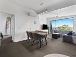TOP FLOOR APARTMENT WITH SOARING CEILINGS, STUNNING VIEWS & RESORT-STYLE LIVING