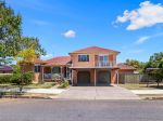 PRIME HILLVUE OPPORTUNITY: SPACIOUS SPLIT-LEVEL HOME WITH UNMATCHED VERSATILITY