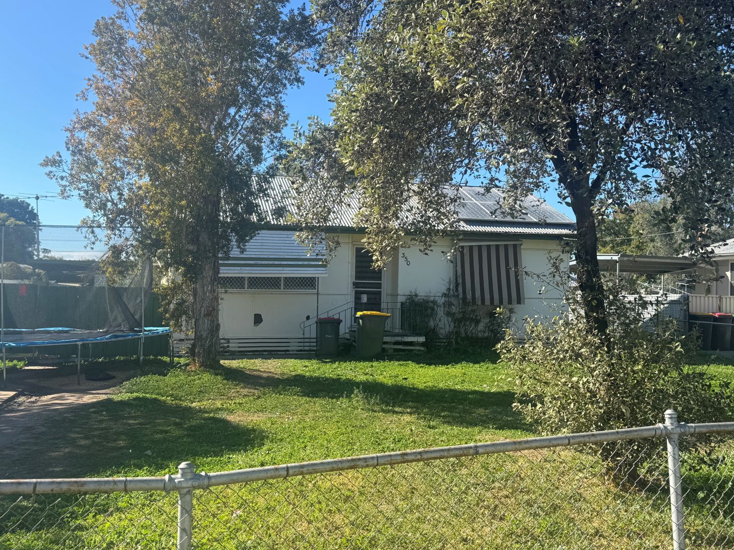 COMFORTABLE TWO-BEDROOM HOME WITH SLEEPOUT