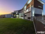 AWARD-WINNING FAMILY HOME WITH STUNNING HINTERLAND VIEWS!
