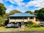 ELEVATED BRICK HOME CLOSE TO SCHOOLS, SHOPS AND MAIN STREET