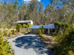 RENOVATED FAMILY HOME ON 2.47 ACRES WITH A TROPICAL FEEL