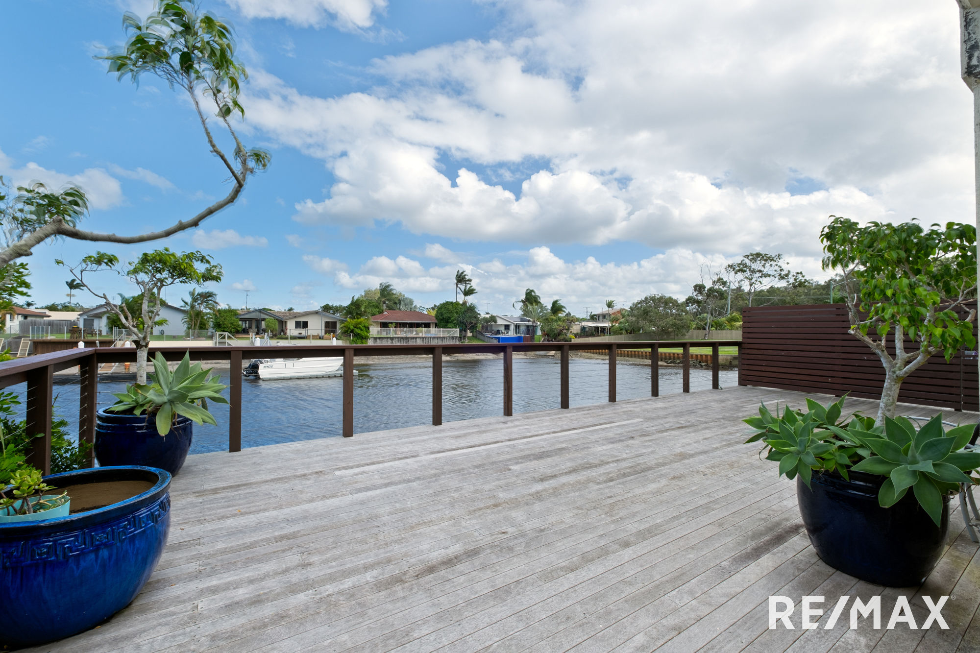 FRESHLY PAINTED WATERSIDE TWO BEDROOM APARTMENT WITH AIR CONDITIONING.