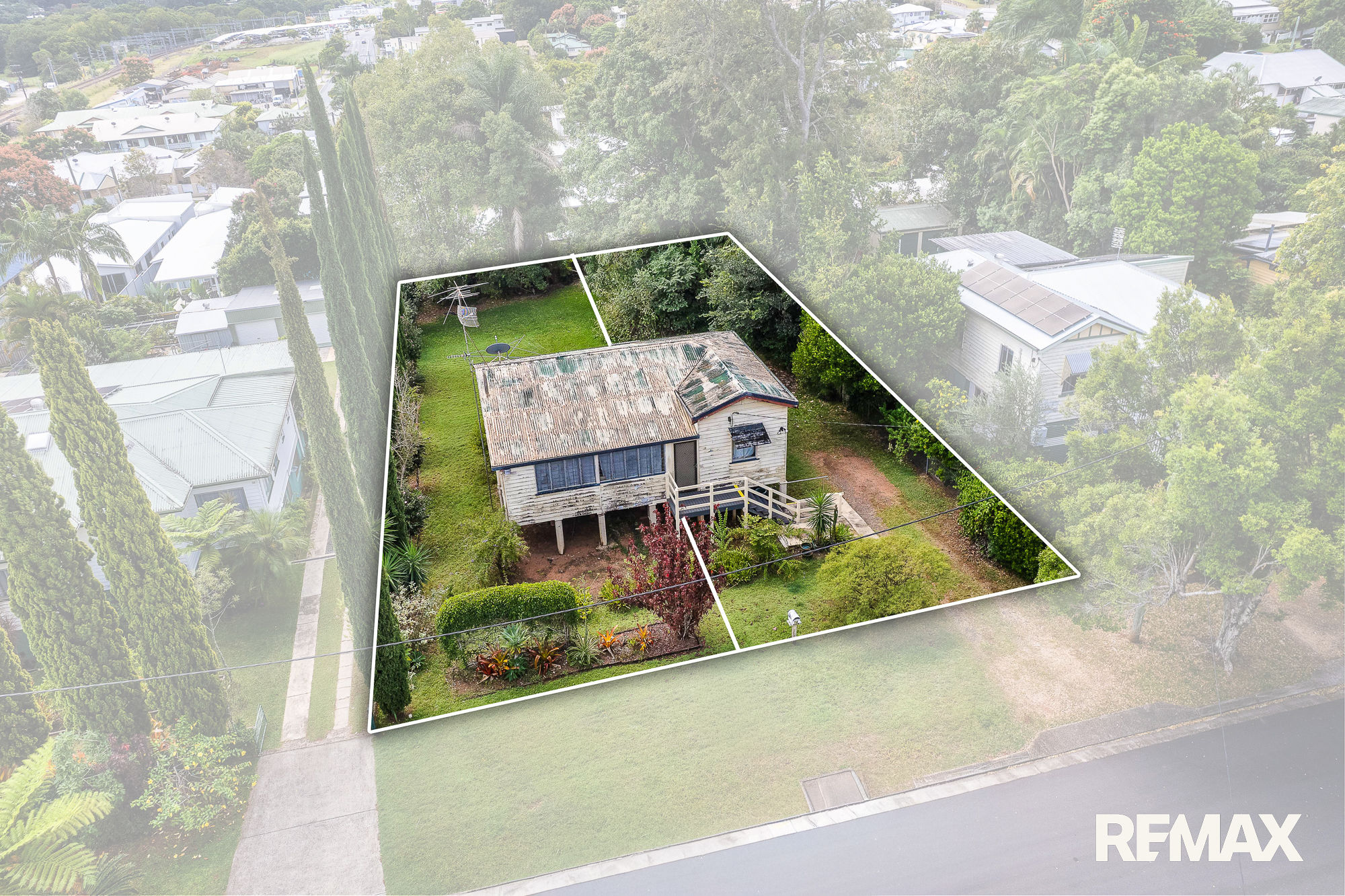 RENOVATOR'S DREAM ON TWO-LOT MEDIUM DENSITY BLOCK WITH SUBDIVISION POTENTIAL