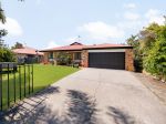 LOW-SET BRICK HOME WITH SIDE ACCESS
