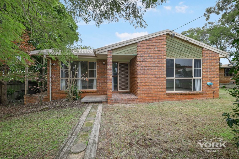 SOLID BRICK HOME WITH RENOVATION POTENTIAL IN A GROWING ROCKVILLE LOCATION