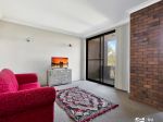 A LOW-MAINTENANCE LIFESTYLE STEPS FROM THE JETTY