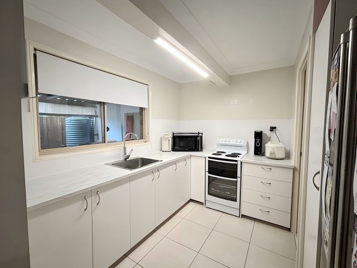 FEATURE-PACKED & MOVE-IN READY - 2-BEDROOM UNIT WITH RARE BACKYARD SPACE!