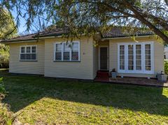 CHARMING LOWSET HOME IN CONVENIENT NEWTOWN LOCATION