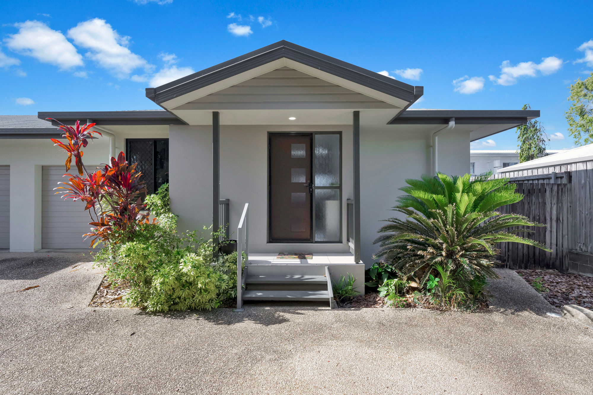 PRIVATE, LOW-MAINTENANCE LIVING AT THE BACK OF THE COMPLEX
