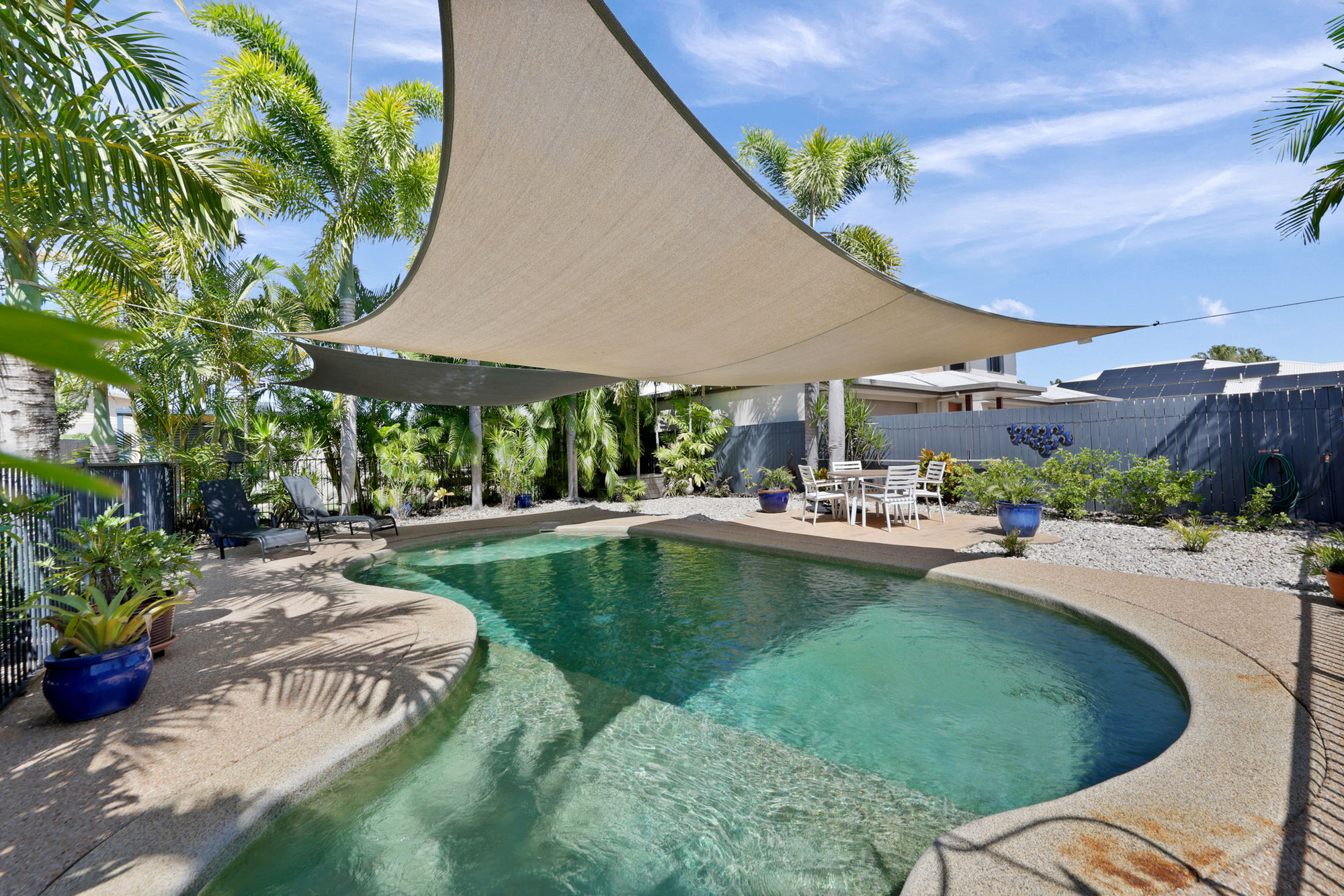 EMBRACE THE ULTIMATE BEACHSIDE LIFESTYLE AT THIS BEAUTIFULLY PRESENTED FAMILY HOME