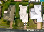 FAMILY HOME WITH SIDE ACCESS IN A CONVENIENT SANDSTONE POINT LOCATION
