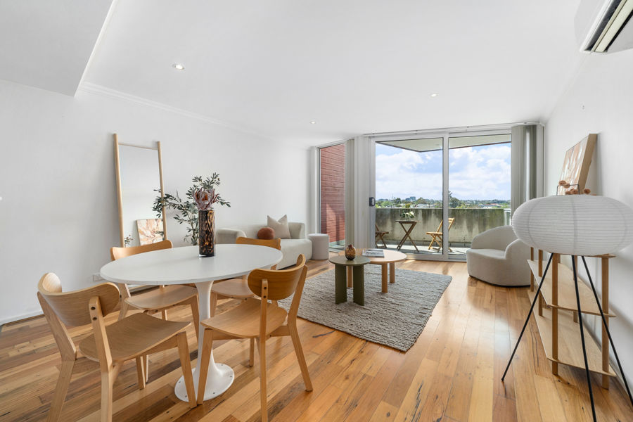 TOWNHOUSE-SIZED, TWO-LEVEL APARTMENT