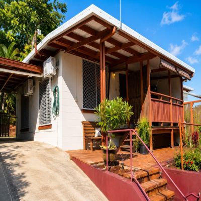 ELEVATED DUPLEX INVESTMENT WITH STUNNING CITY VIEWS