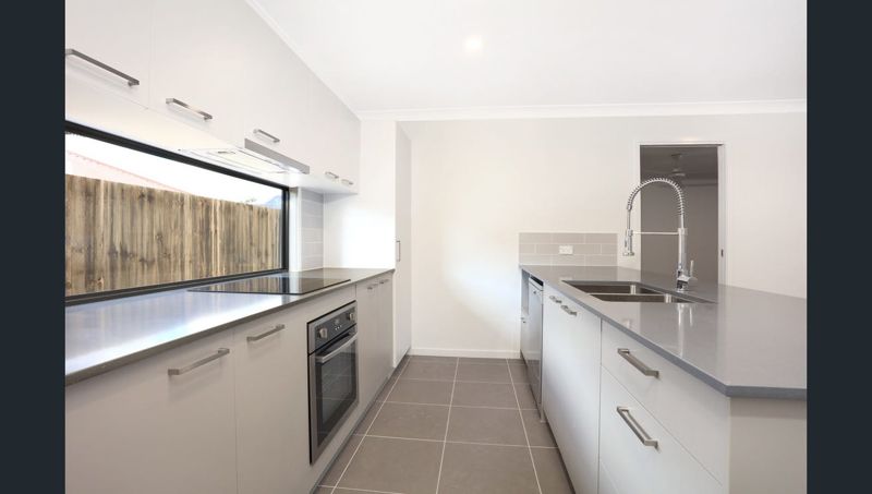 MODERN FAMILY LIVING IN A CONVENIENT HOLMVIEW LOCATION