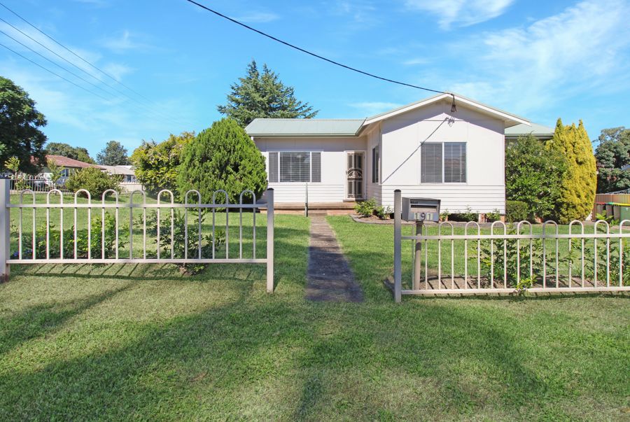 CONVENIENTLY LOCATED THREE-BEDROOM HOME