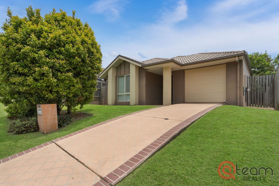 LOW MAINTENANCE MODERN HOME WITH STRONG RENTAL APPEAL!
