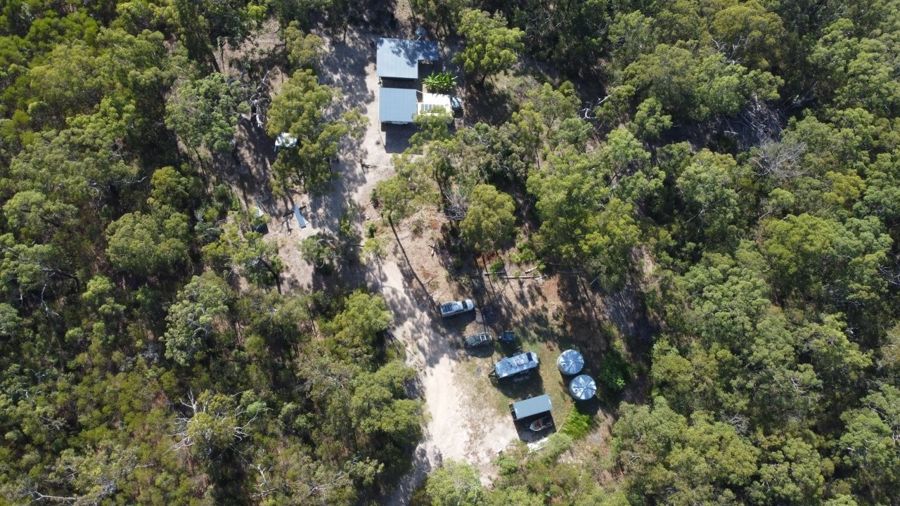 COASTAL ESCAPE WITH OFF GRID COMFORT ON 40 ACRES