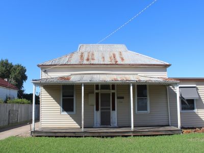 IDEALLY LOCATED 4-BEDROOM HOME!