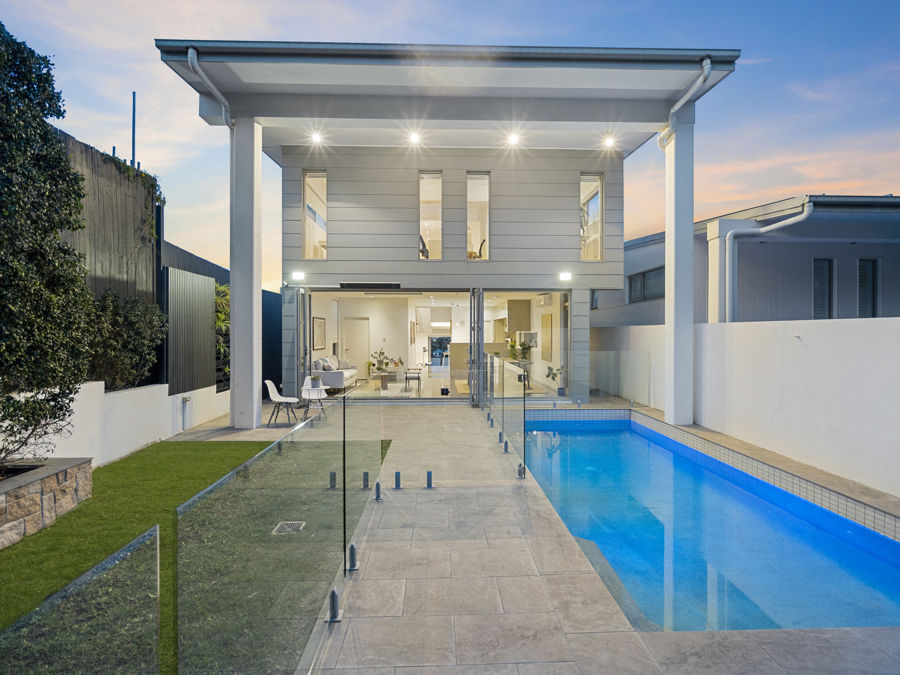 ARCHITECTURAL LUXURY WITH SWEEPING RIVER VIEWS AND PARKLAND PRIVACY