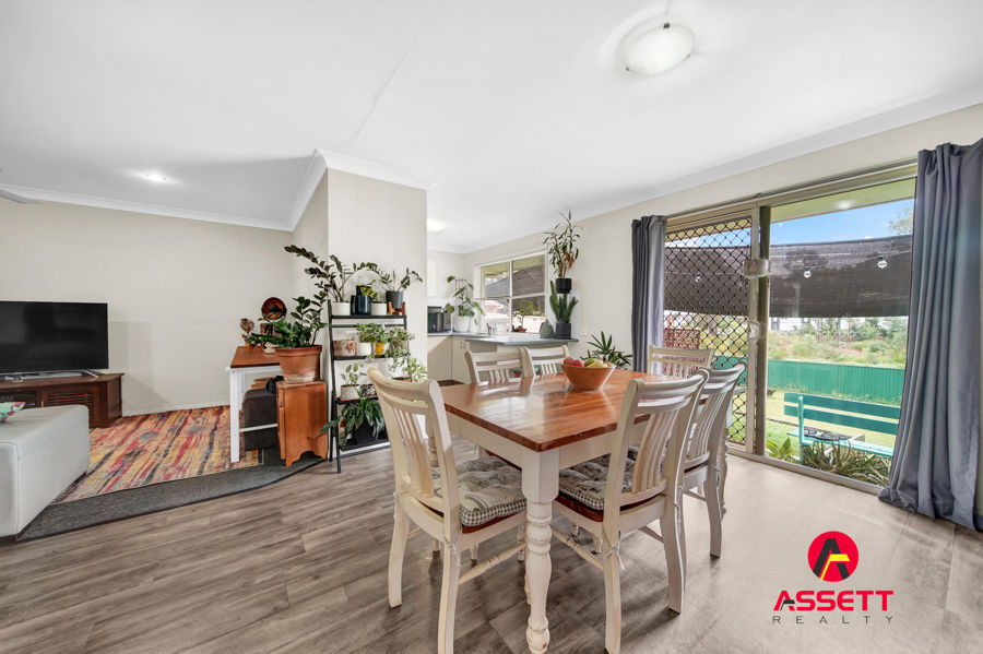 CONVENIENTLY LOCATED BRICK FAMILY HOME OR INVESTMENT ON LARGE 720 M2 IN REDBANK PLAINS