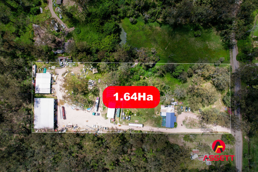 RARE 4 ACRES LAND WITH LARGE TRUCK SHED WITH HOUSE