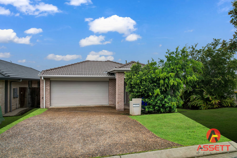 SPACIOUS  MODERN 4 BEDROOM, 2 LIVING  LOW-SET BRICK HOME IN BRASSALL