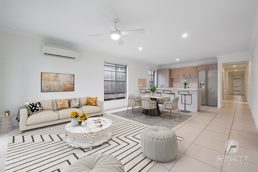 MODERN 4 BED  FAMILY HOME ... 2 X LIVING AREAS ... IN THRIVING REDBANK PLAINS