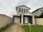 SPACIOUS 4-BEDROOM HOME IN CONVENIENT MAGILL LOCATION
