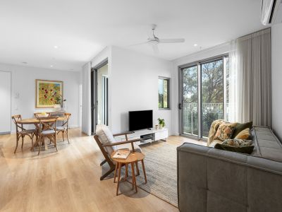 RARE GROUND-FLOOR WATERFRONT GEM WITH A FENCED YARD!