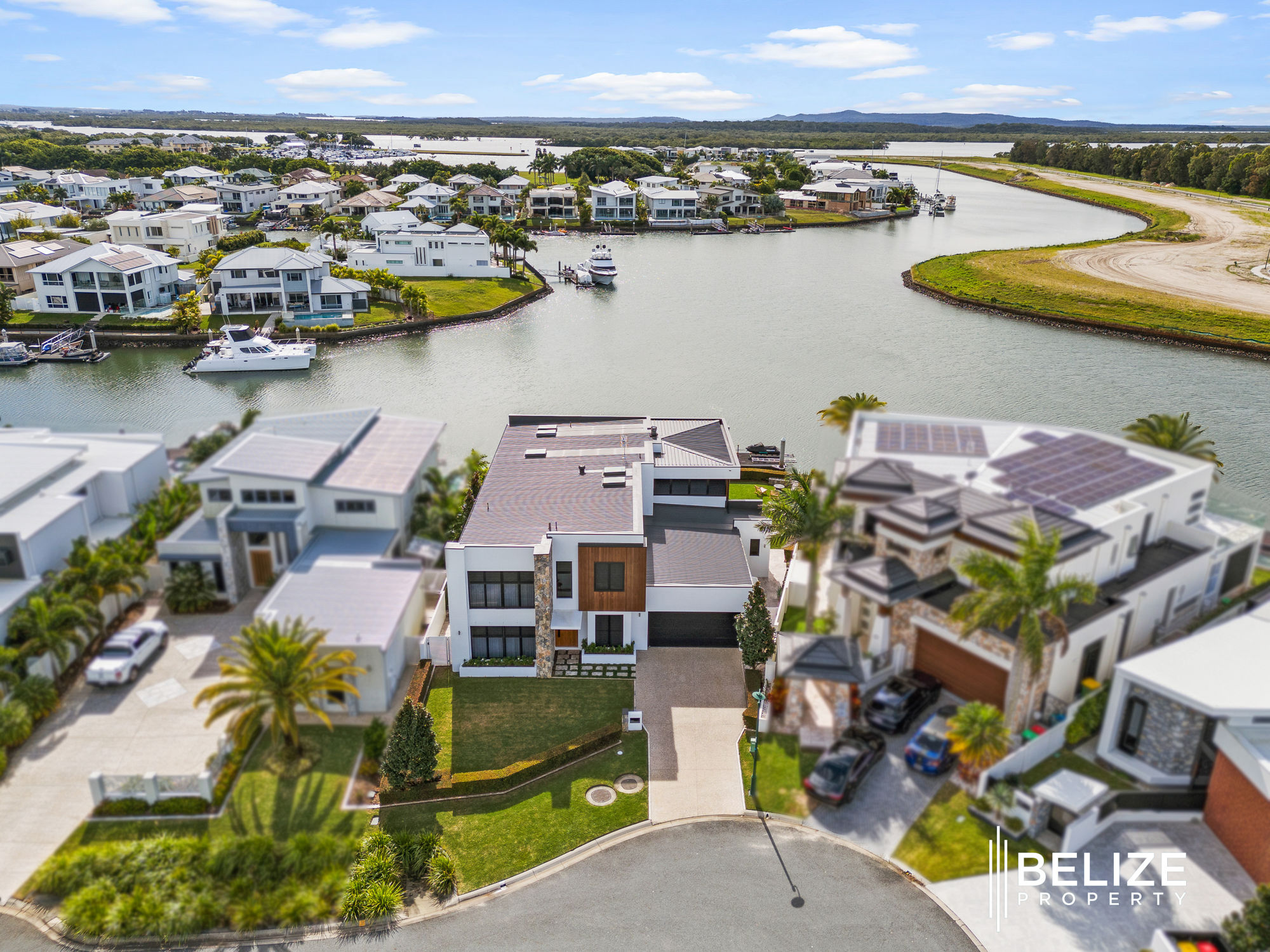 EXQUISITE WATERFRONT HOME IN CALYPSO BAY, GOLD COAST - LUXURY LIVING AT ITS FINEST