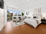 TOP FLOOR APARTMENT WITH CITY FRINGE CONVENIENCE & SYDNEY HARBOUR BRIDGE VIEWS