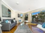 SUN-DRENCHED BOUTIQUE TOWNHOUSE WITH ENTERTAINERS COURTYARD + DOUBLE GARAGE - LEASED