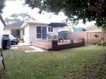 GRANNY FLAT WITH PRIVATE REAR ENTRY AND LARGE DECK UTILITIES INCLUDED