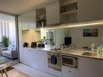 FULLY FURNISHED DARLINGHURST APARTMENT BALCONY AND POOL HARBOUR VIEWS.