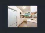 RENOVATED APARTMENT CLOSE TO ALL AMENITIES WITH DISTRICT VIEWS..