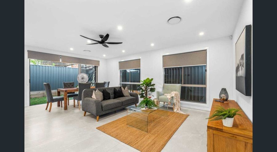 IMMACULATE NEAR NEW HOME WITH PREMIUM FINISHES IN A GROWING COMMUNITY