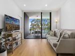 SUN FILLED, DESIGNER LUXURY SUB PENTHOUSE APARTMENT WITH AMAZING VIEWS