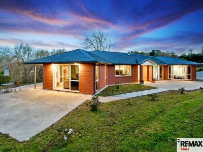 SPACE, STYLE & A YARD YOU'LL NEVER WANT TO LEAVE