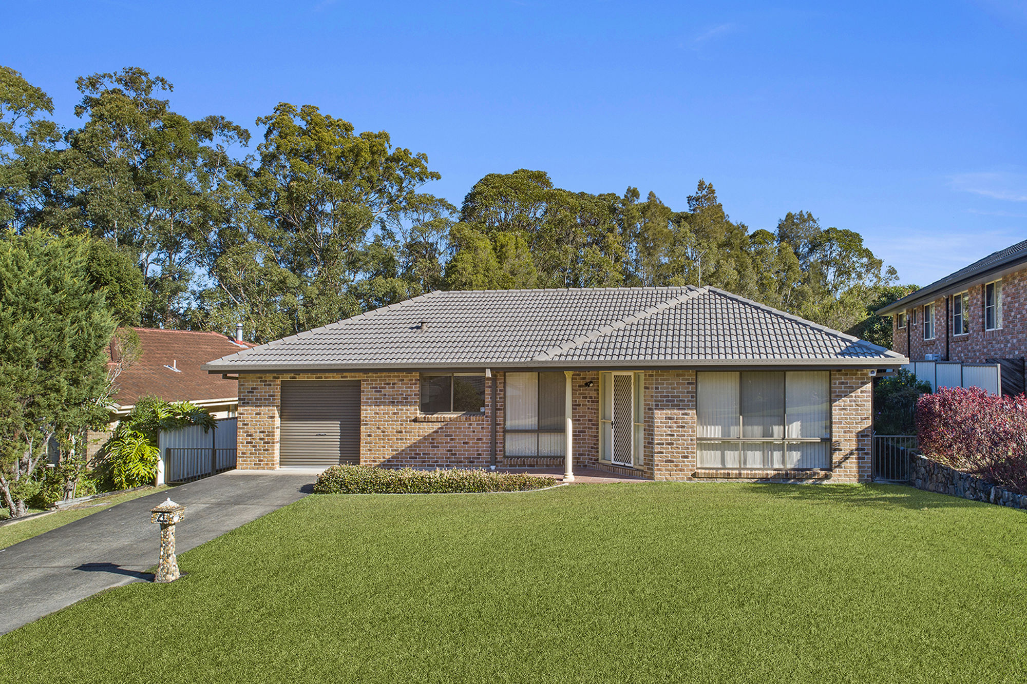 REASONABLY FLAT, LARGE BLOCK WITH SIDE ACCESS TO THE REAR YARD.