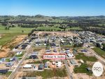 WHEN LAND IS IN DEMAND...