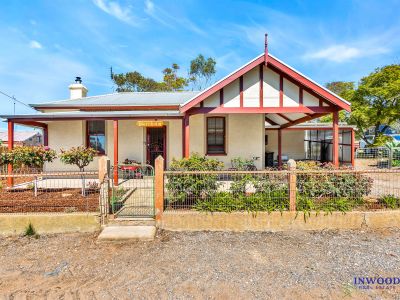 AFFORDABLE AND CHARMING - CHARACTER STONE HOME IN PRIME PALMER LOCATION, LARGE BLOCK, SHEDS, OUTDOOR ENTERTAINING AREA