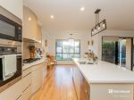 IMMACULATE 4-BEDROOM HOME IN THE HEART OF CORLETTE