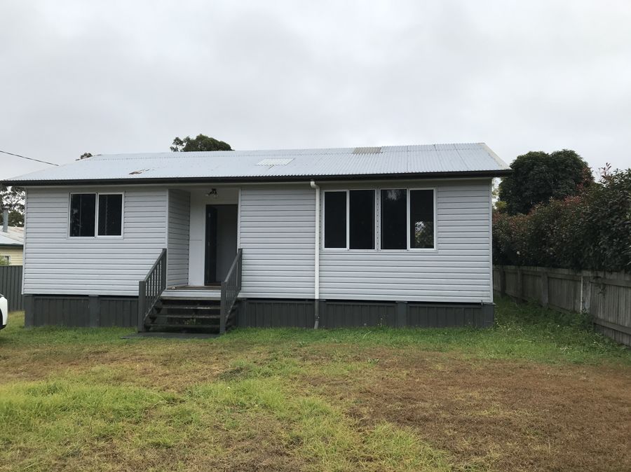 RENOVATED THREE BEDROOM HOME IN QUIET CROWS NEST STREET