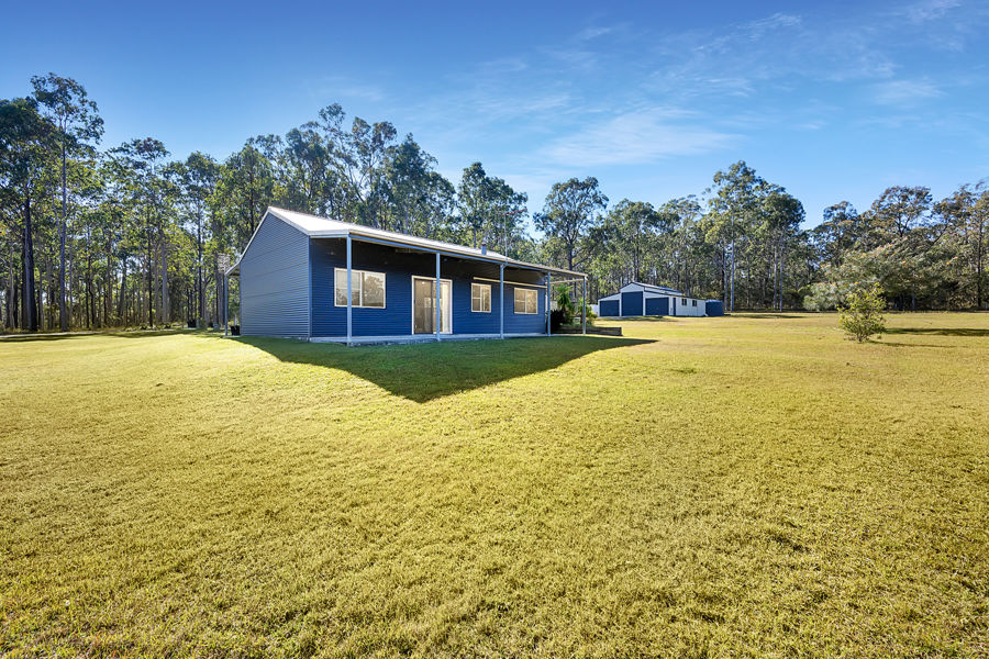 PRIVATE ACREAGE RETREAT WITH SHED SPACE TO MATCH