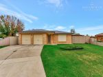 FAMILY-FRIENDLY HOME WITH DOUBLE CARPORT AND WORKSHOP SHED