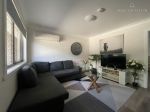 A WELL-PRESENTED, WELL-MAINTAINED, AND TIDY 2-BEDROOM UNIT