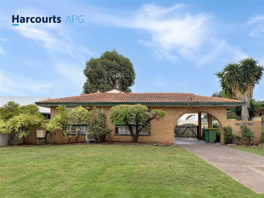 CHARMING 3-BEDROOM HOME WITH EXPANSIVE BACKYARD & GARDEN POTENTIAL